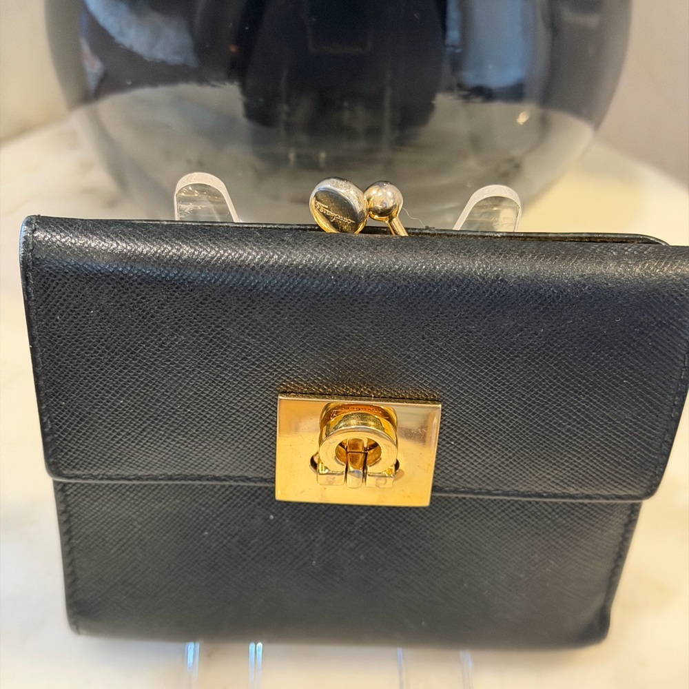 Salvatore Ferragamo Black Leather Wallet with Gold Clasp and kisslock.